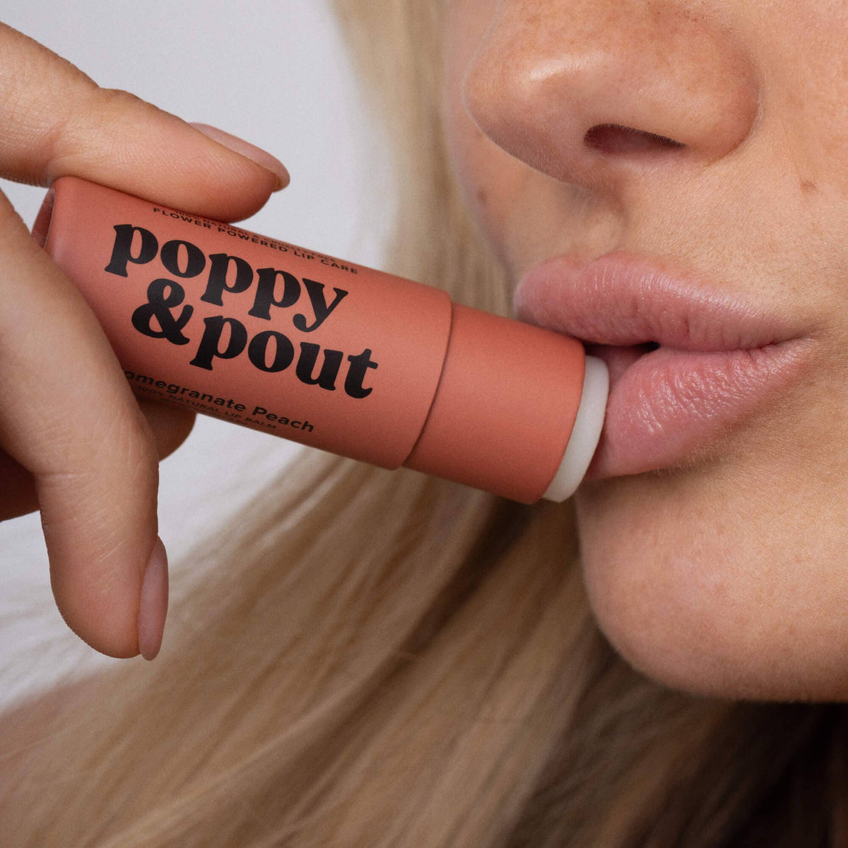 Poppy & Pout natural lip balm in Pomegranate Peach, eco-friendly tube, view 2
