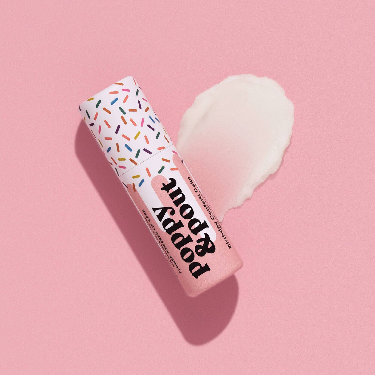 Poppy & Pout natural lip balm in Birthday Confetti Cake, eco-friendly tube