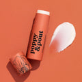 Poppy & Pout natural lip balm in Pomegranate Peach, eco-friendly tube