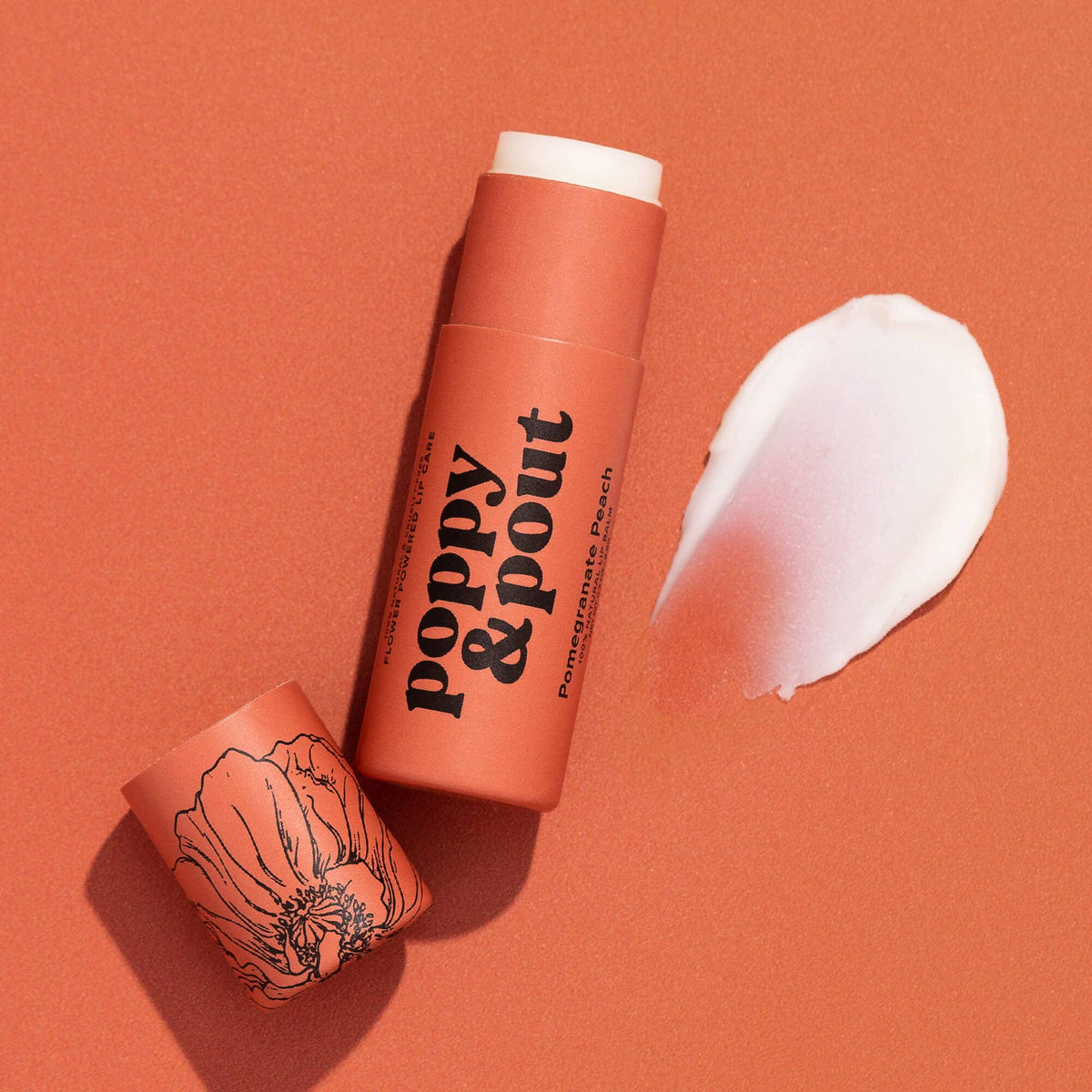 Poppy & Pout natural lip balm in Pomegranate Peach, eco-friendly tube