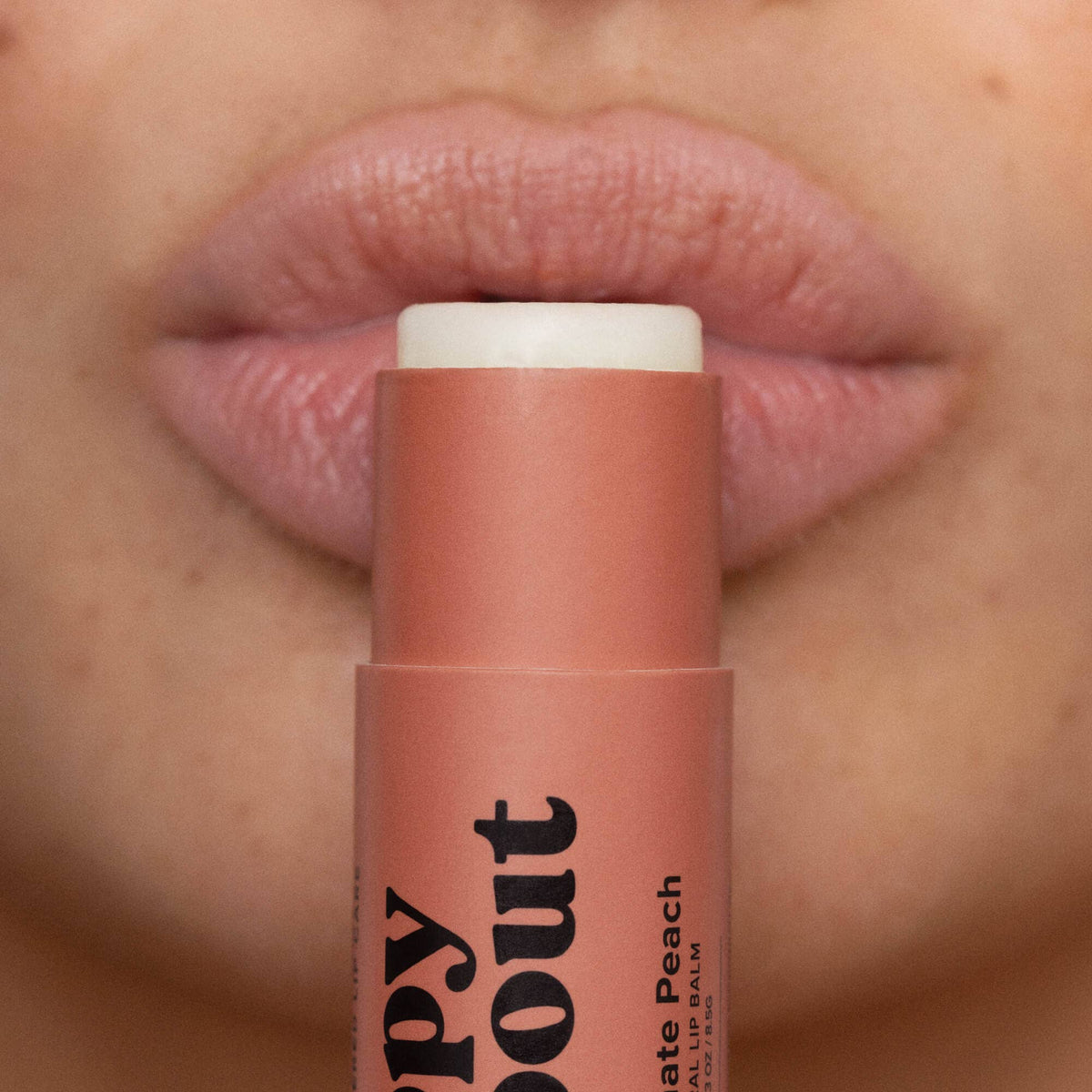 Poppy & Pout natural lip balm in Pomegranate Peach, eco-friendly tube, view 5